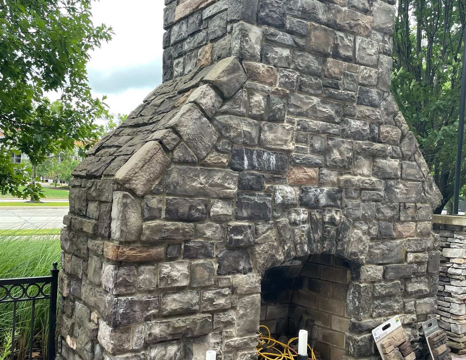 Custom stone outdoor fireplace by Mason One, Rocky River OH